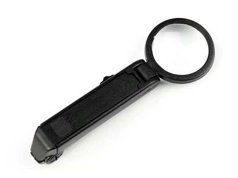 lupa de mano con brusela y luz led codigo 17134