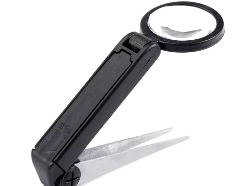 lupa de mano con brusela y luz led codigo 17134